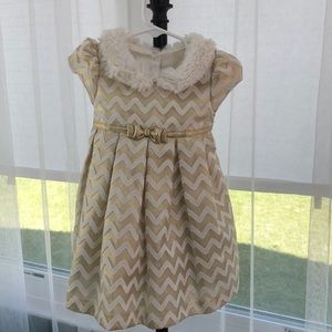 Jon’s Michelle white and gold dress.